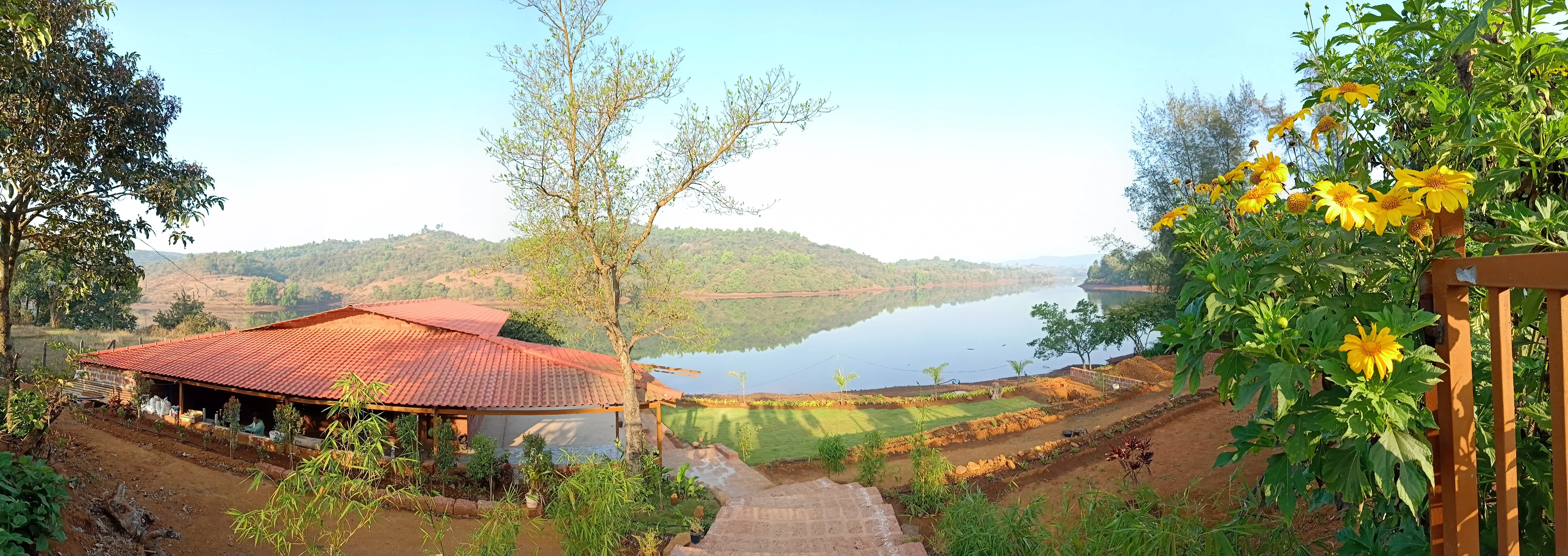 Peaceful lake view from Viva Andur farmhouse